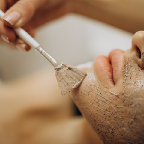 Woman visiting cosmetologist and making rejuvenation procedures